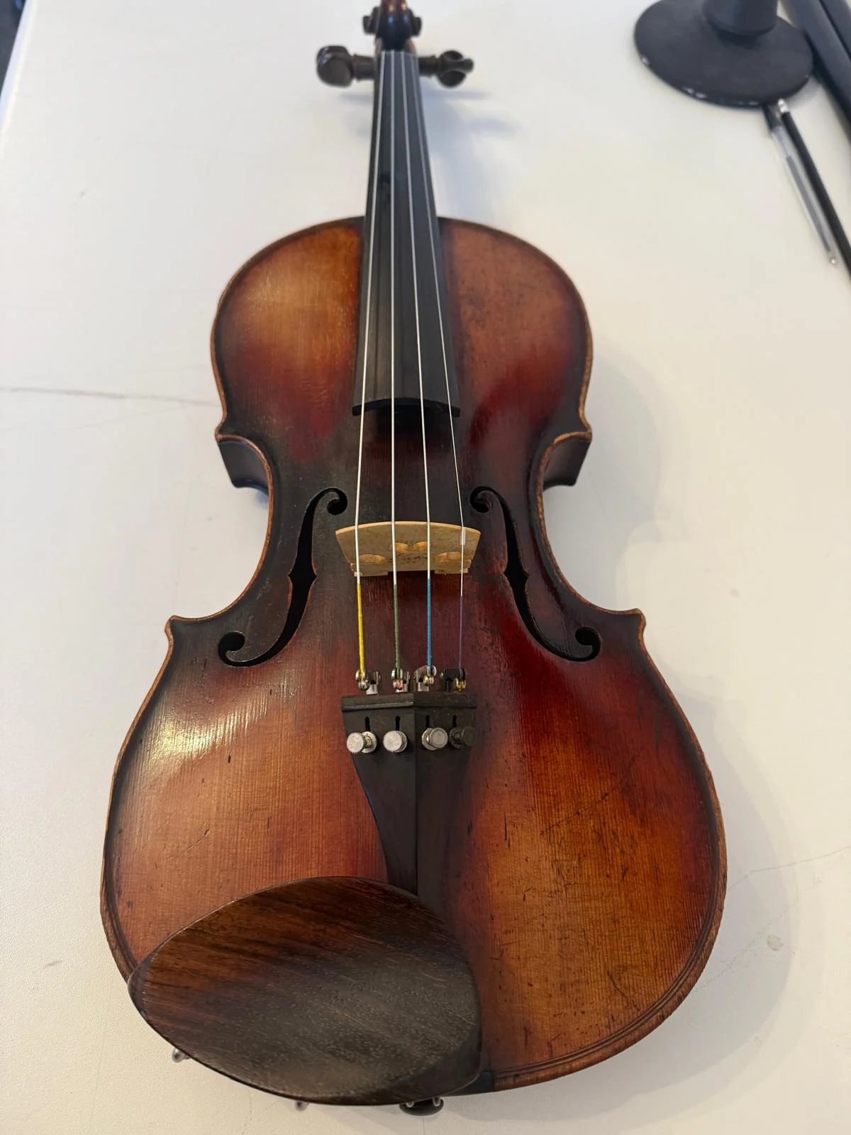 Violin after a full service with a cleaner and shinier finish