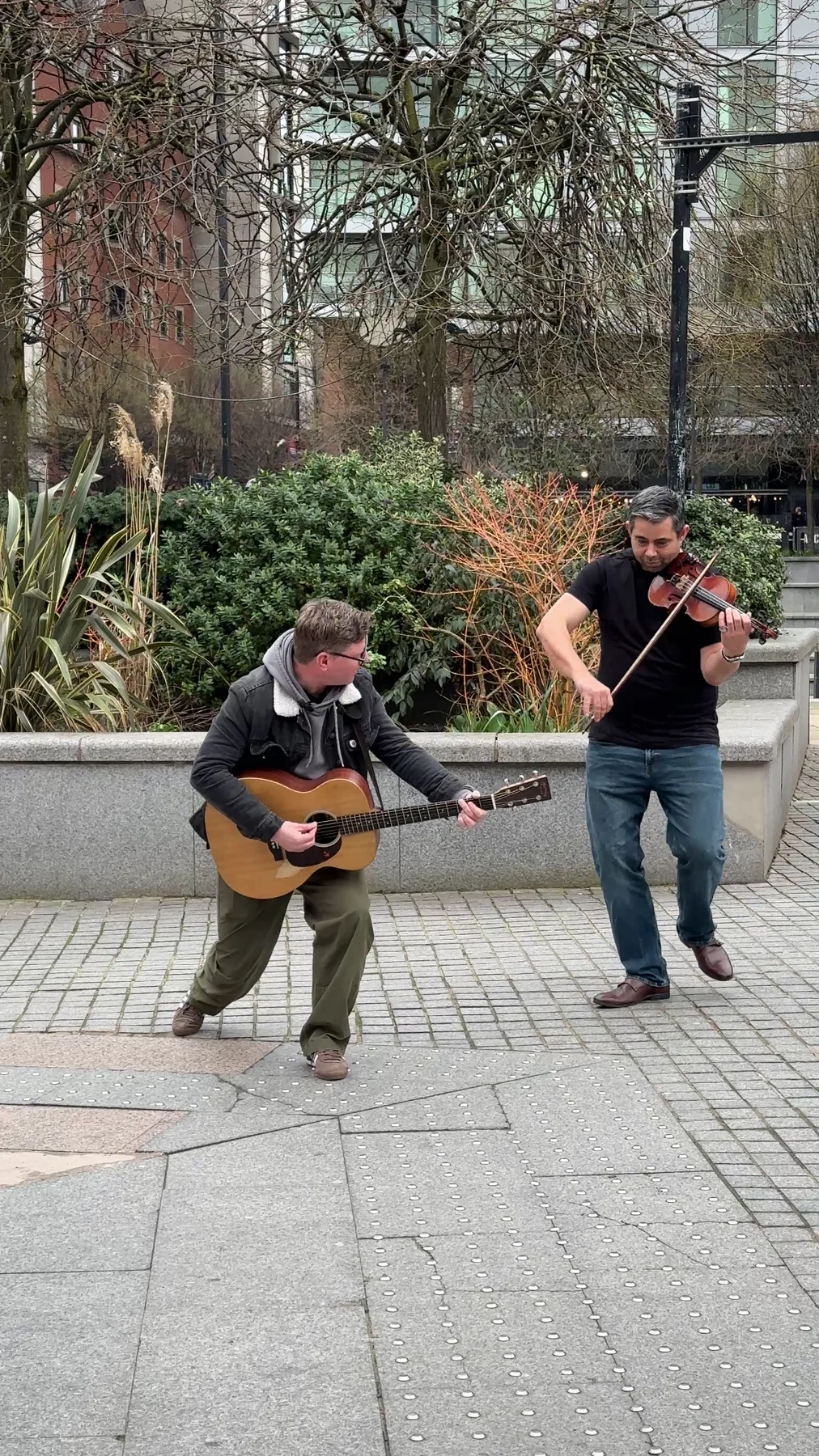 Damian John Farrell and James Taylor performing outdoors as To Hell or Verona