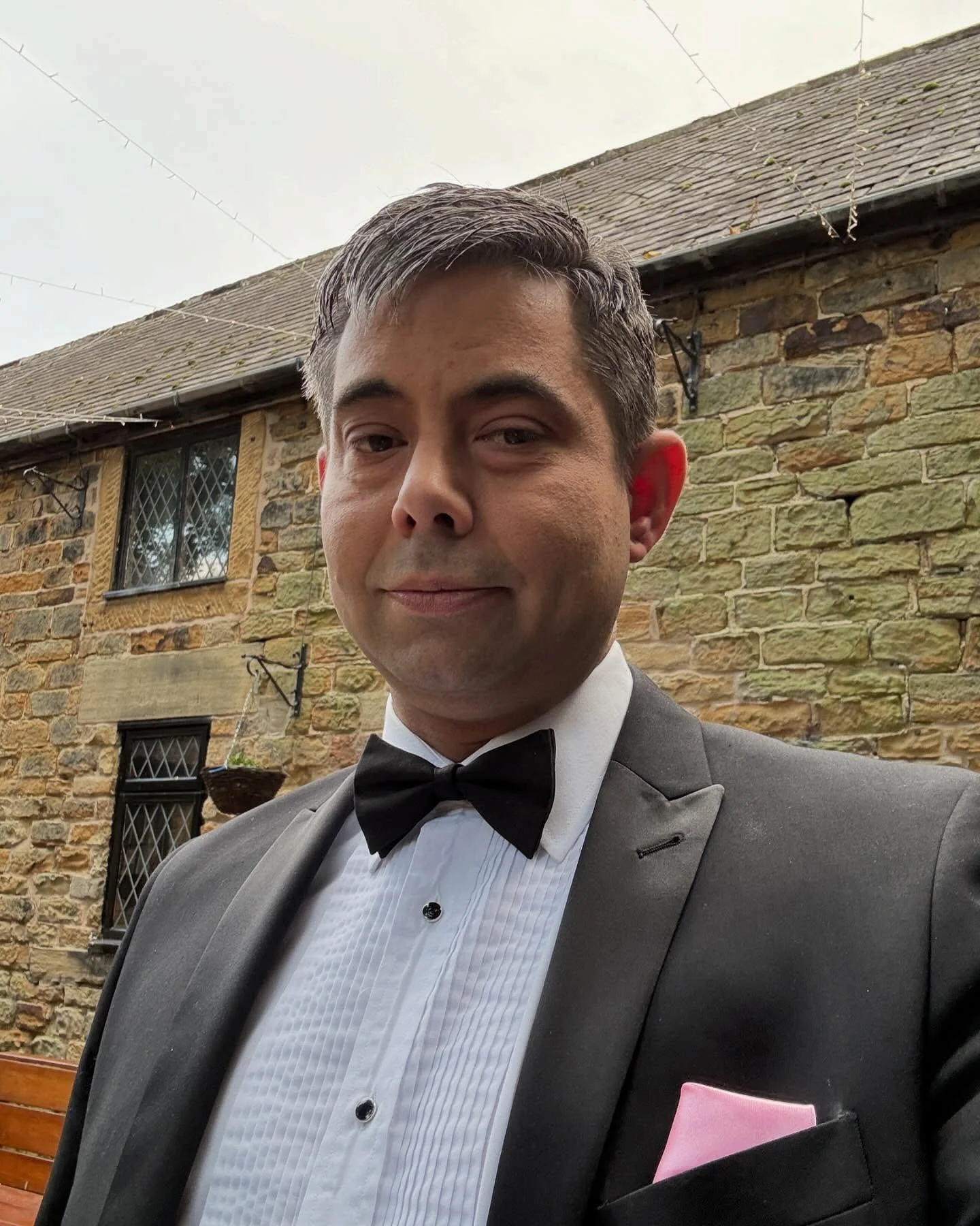 James dressed for a formal corporate occasion